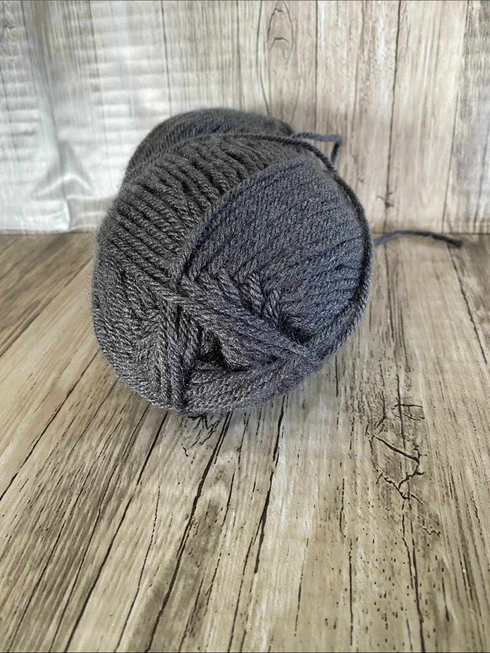 1 BALL OF GRAY YARN